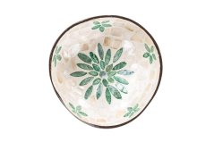 Coconut bowl with green leaf
