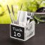 Wooden cutlery stand with chalkboard