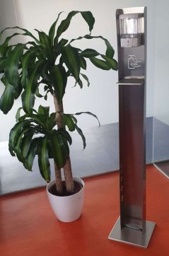 Metal stand with disinfectant dispenser