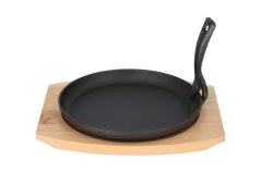 Cast iron frying pan on a wooden board GRADA - 22 cm