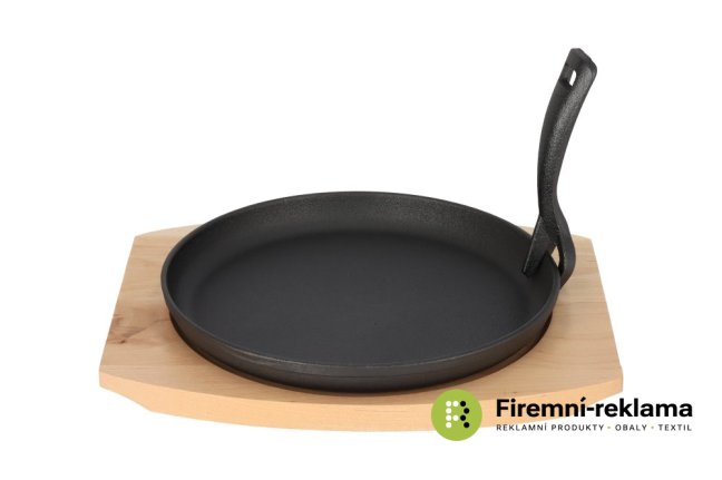 Cast iron frying pan on a wooden board GRADA - 22 cm