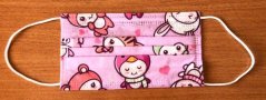 Disposable mask with all-over print
