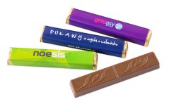 Baroness promotional chocolates with full-color printing on paper wrappers, oblong chocolates with fillings (strawberry, coconut, hazelnut, latte macchiato), suitable for corporate events, as seasonal gifts, thank-you gifts for business partners, and for sales promotion.